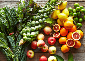 a group of fruits and vegetables on a wood surface Healthy Weight Loss Diets Dunfermline